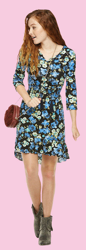 girl in dress with handbag and boots